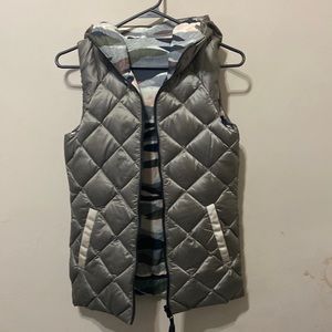 Reversible vest with hoodie in mint condition.